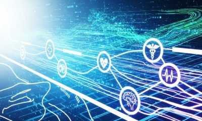 Representação futurista de redes neurais e dados médicos fluindo, ilustrando o papel da inteligência artificial na saúde e sua precisão em diagnósticos e tratamentos.