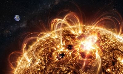 Regiões ativas do Sol em destaque, com campos magnéticos intensos e erupções solares visíveis, ilustrando a complexidade do clima espacial.